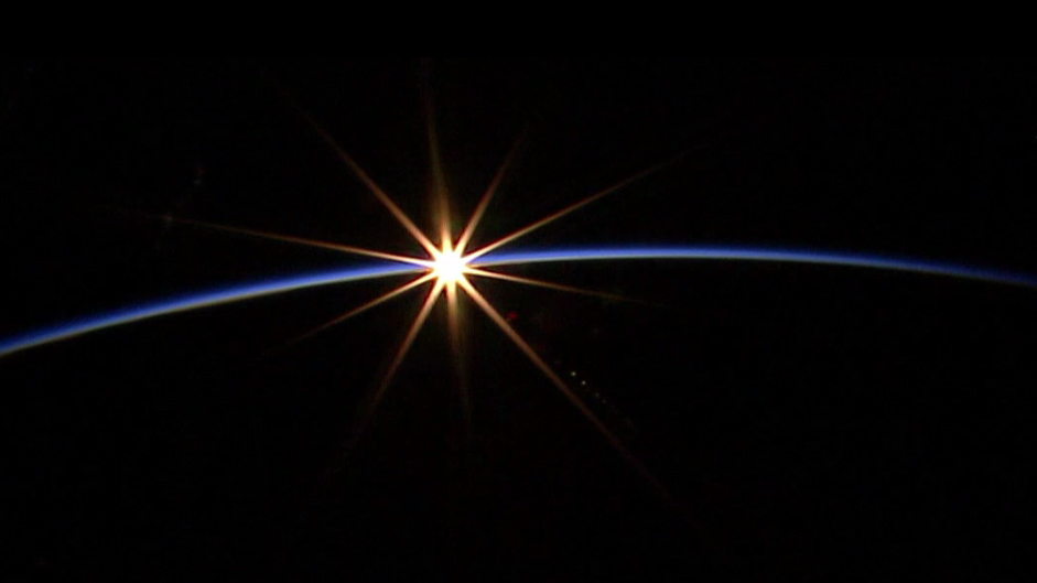 A sunrise is seen from the International Space Station a few minutes before the beginning of Thursday's spacewalk.