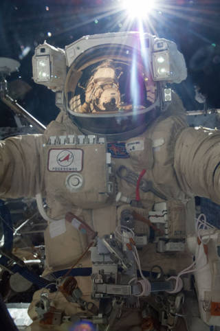 Flight Engineer Alexander Misurkin participates in a spacewalk to continue outfitting the International Space Station.