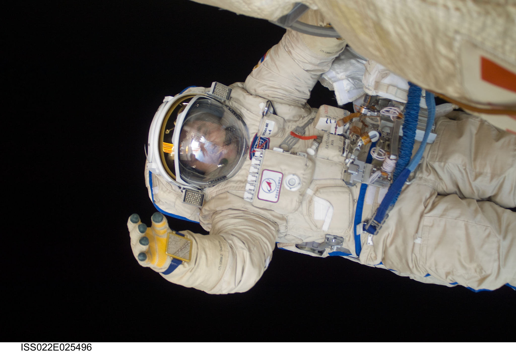Spacewalker Maxim Suraev works outside the Poisk mini-research module in January 2010.