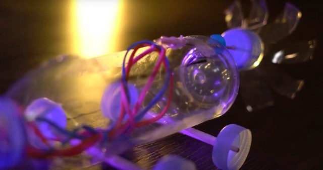 Image of a rubber band propeller car made from a plastic water bottle.