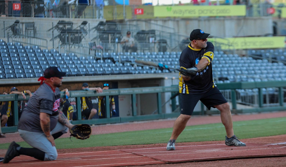 Pelfrey takes a turn at bat during the Armed Forces Celebration Week softball game June 27 at Toyota Field.
