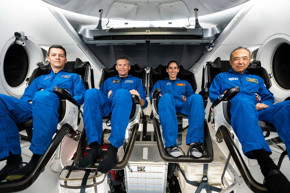 The four crew members of NASA's SpaceX Crew-7 mission are seated inside the SpaceX Dragon during a training session at the company's headquarters in Hawthorne, California.