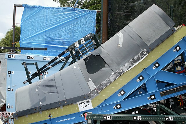 Wing Leading edge test article after impact, showing a big hole in RCC panel 8