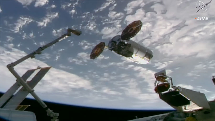 Northrop Grumman's Cygnus space freighter is pictured moments before being captured with the Canadarm2 robotic arm by NASA astronaut Woody Hoburg. Credit: NASA TV