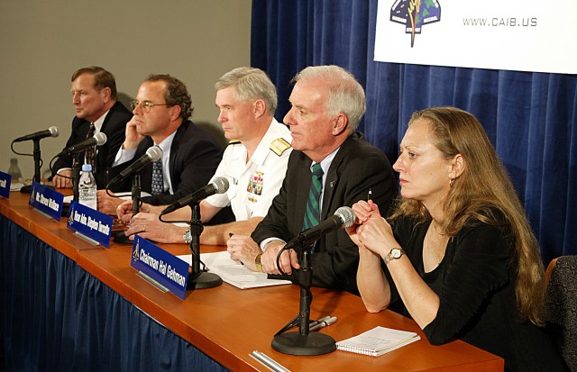 Members of the Columbia Accident Investigation Board sit behind a table during a press briefing