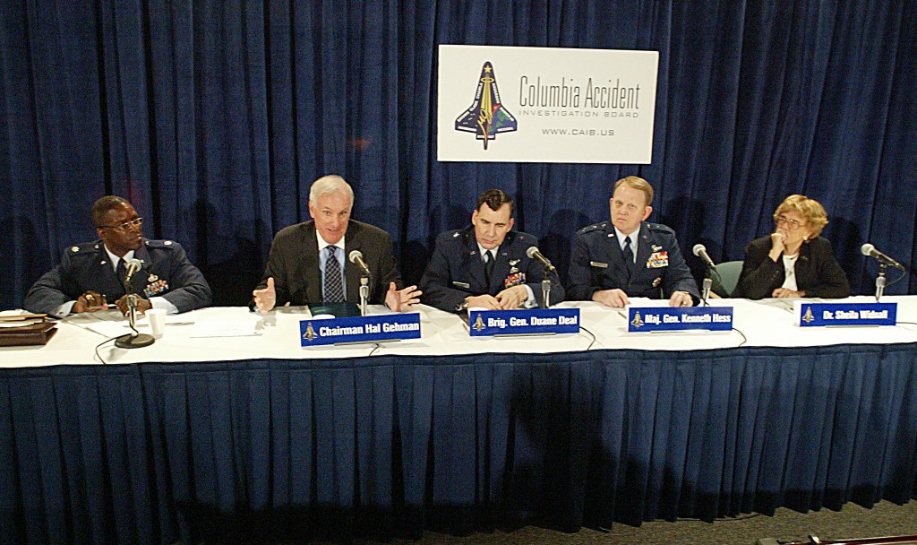 Chairman Hal Gehman speaks during a CAIB press conference