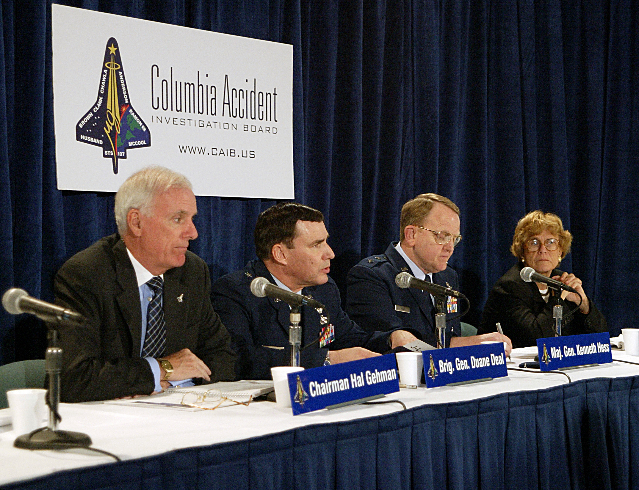 Representatives of the CAIB appear at a press briefing.