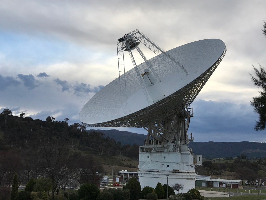 A 230-foot-wide antenna at Canberra Deep Space Communications Complex near Canberra, Australia.