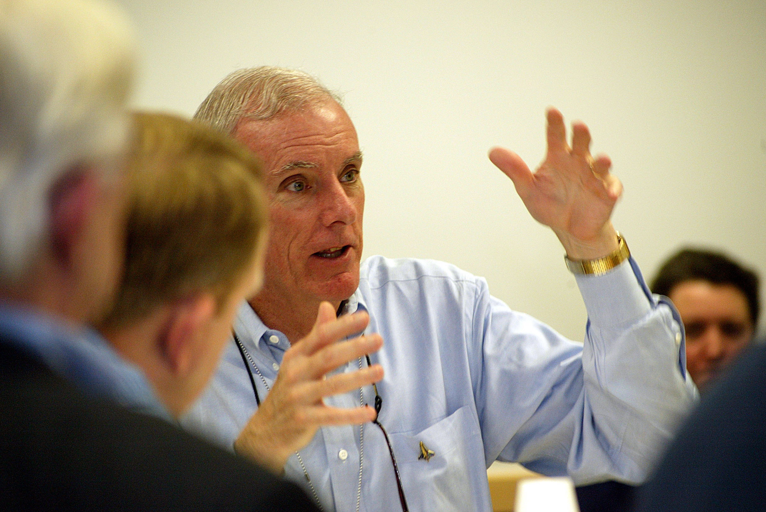 CAIB Chairman Hal Gehman explaining to others