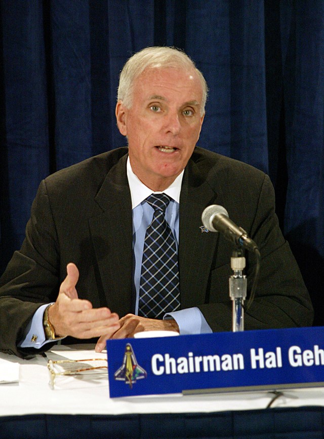 Chairman Hal Gehman speaks at a press conference