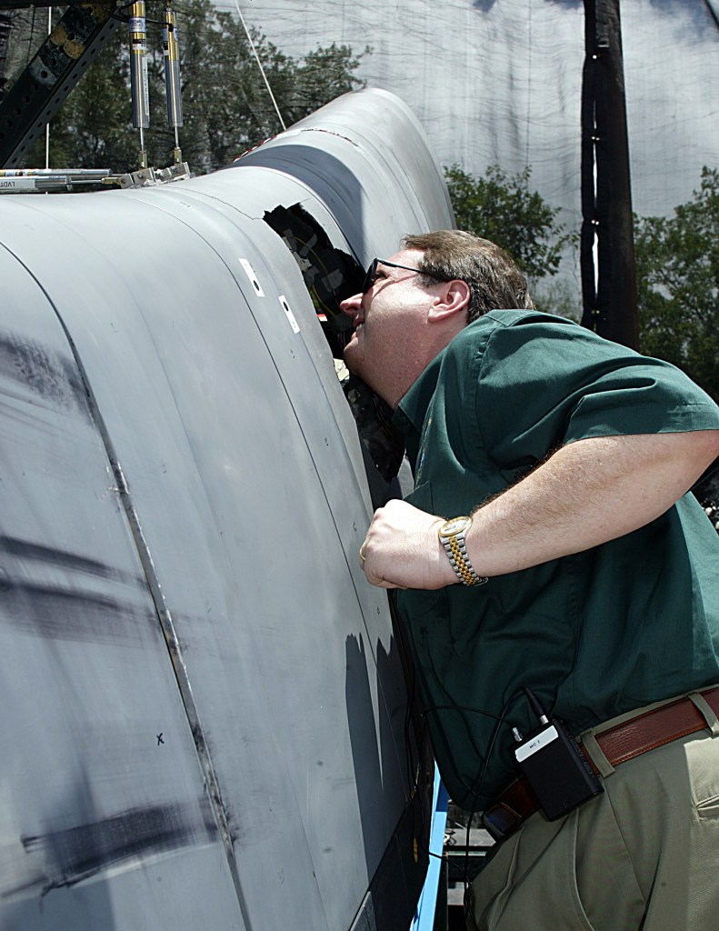 CAIB board member Scott Hubbard Inspects Damage