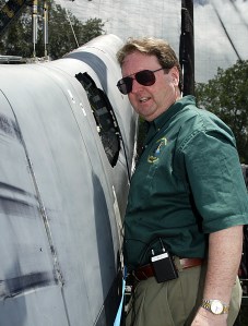 CAIB board member Scott Hubbard inspects damage