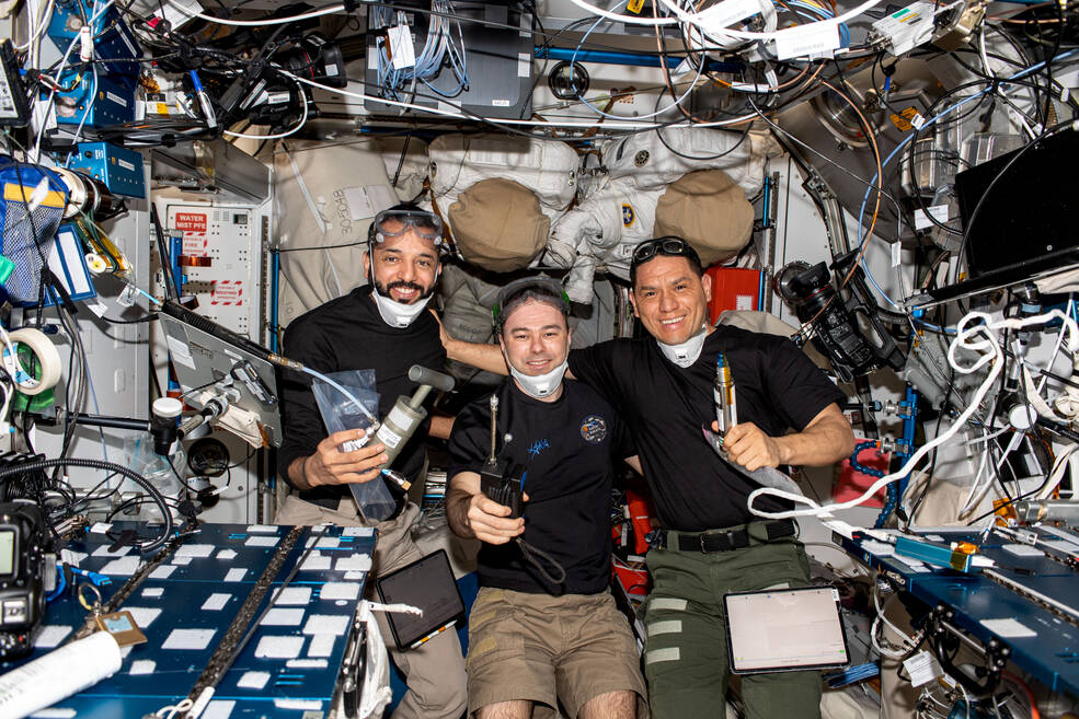 UAE (United Arab Emirates) astronaut Sultan Alneyadi, cosmonaut Dmitry Petelin, and NASA astronaut Frank Rubio perform sampling for ESAs ANITA-2.