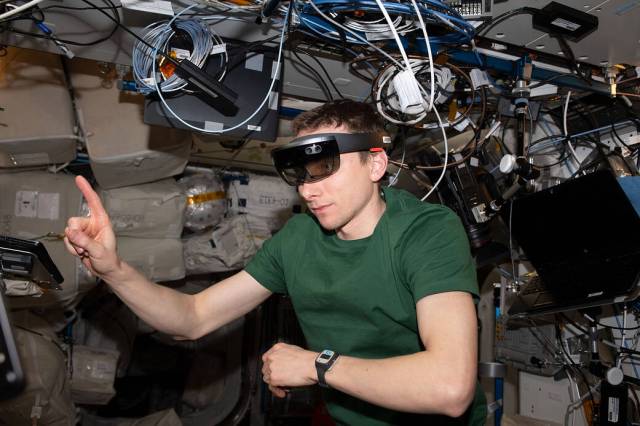 Astronaut Woody Hoburg tests augmented reality goggles