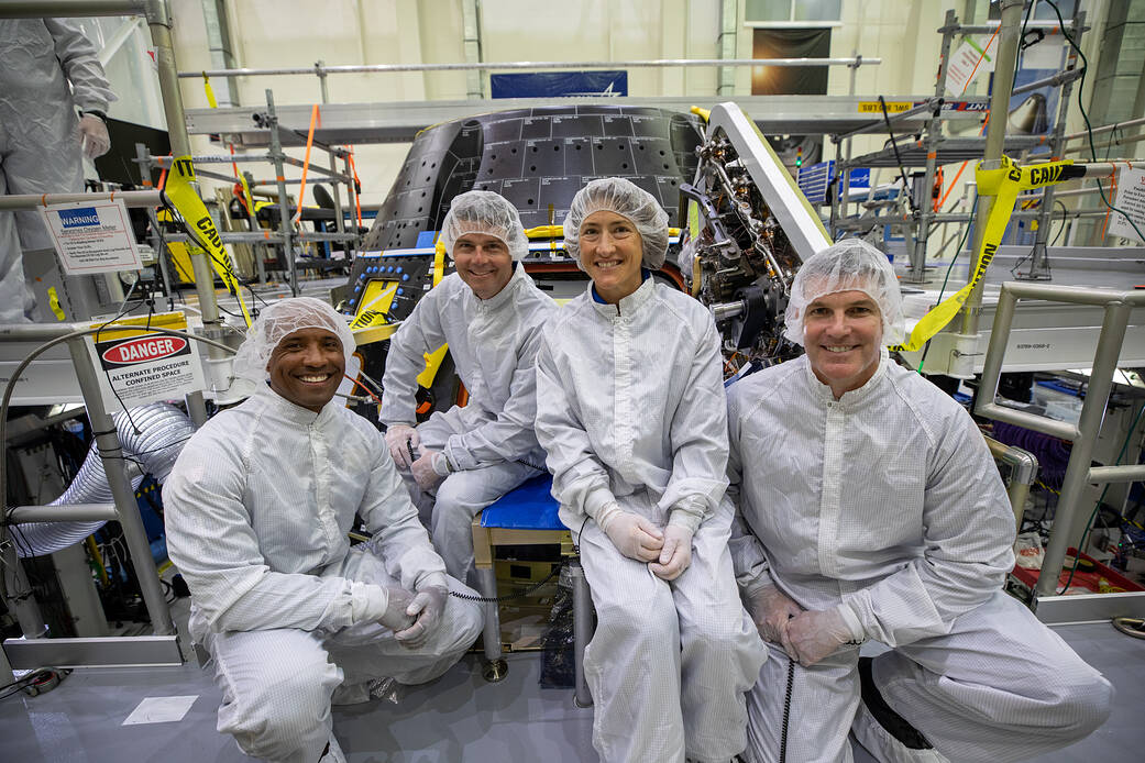 Artemis II crew members inspect their Orion crew module at NASA’s Kennedy Space Center in Florida, on Aug. 7, 2023. From left are: Victor Glover, Reid Wiseman, Christina Hammock Koch, and Jeremy Hansen.