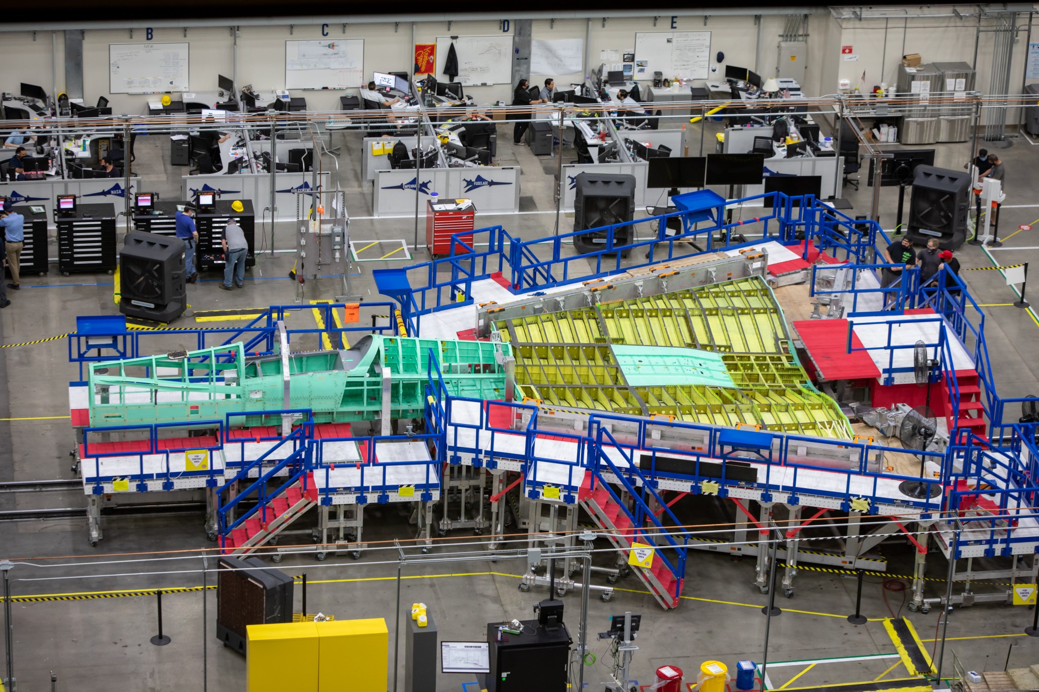 The wing and cockpit sections of NASA’s X-59 QueSST getting assembled.