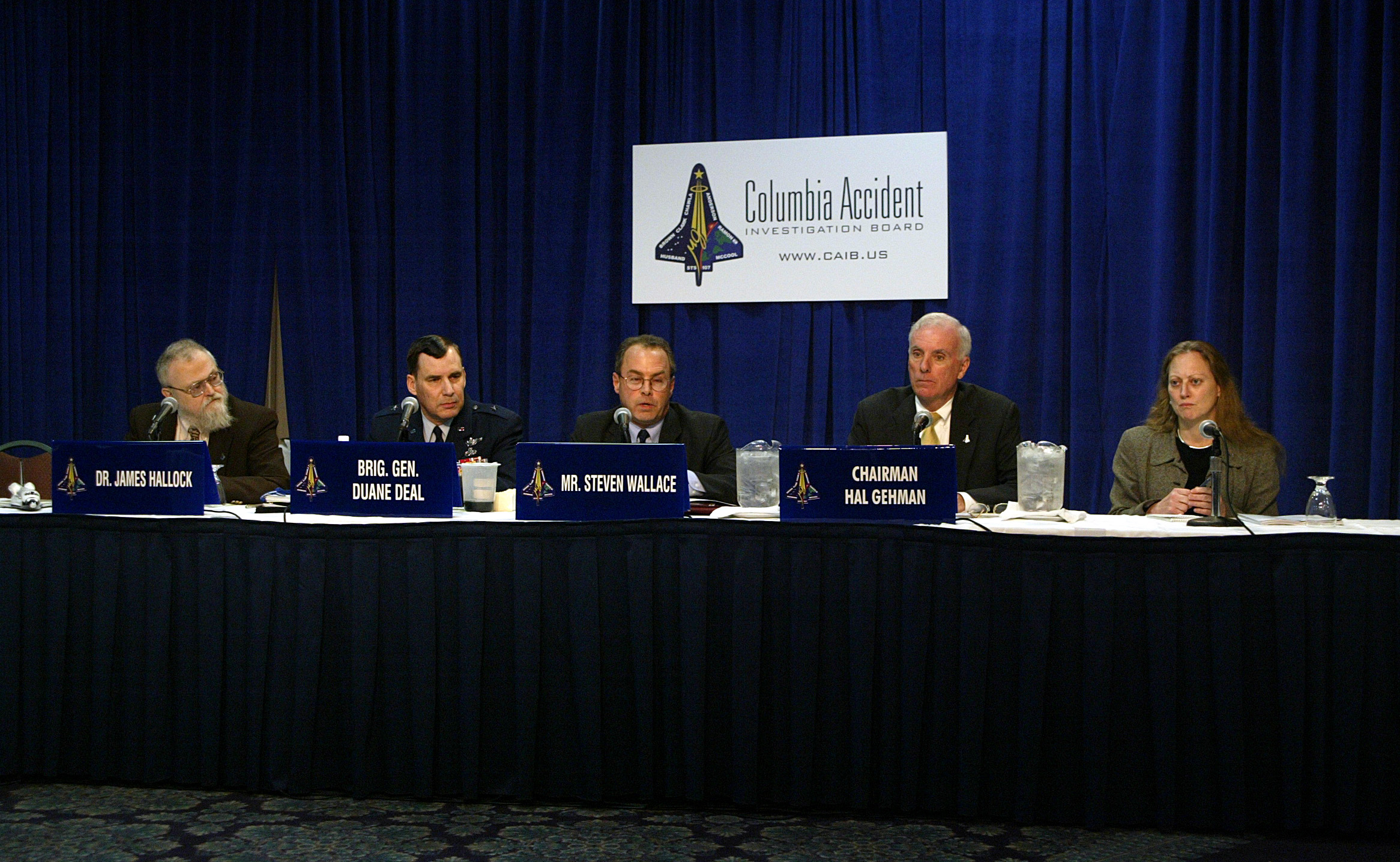 CAIB board members speak at a press briefing