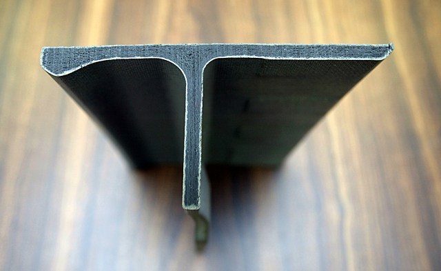 T-shaped cross-section of Reinforced Carbon Carbon on a table