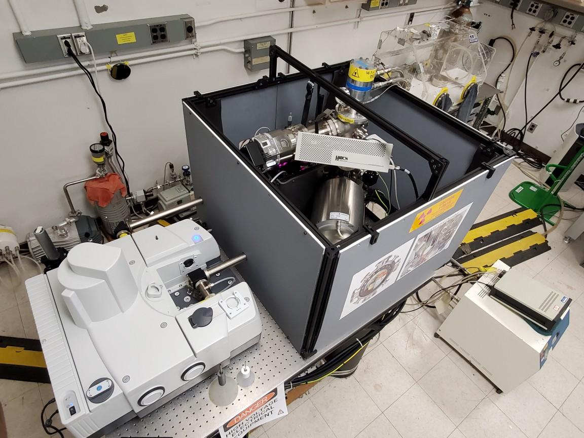 The ICEE UHV chamber that looks similar to a big grey printer along side a square chamber with Xray shielding to prevent potential X-ray leakage due to high energy electrons.