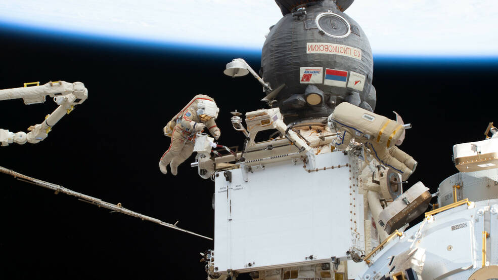 Roscosmos cosmonauts Sergey Prokopyev and Dmitri Petelin conduct a six-hour and 25-minute spacewalk in their Orlan spacesuits to transfer a radiator from the Rassvet module to the Nauka multipurpose laboratory module for future installation.