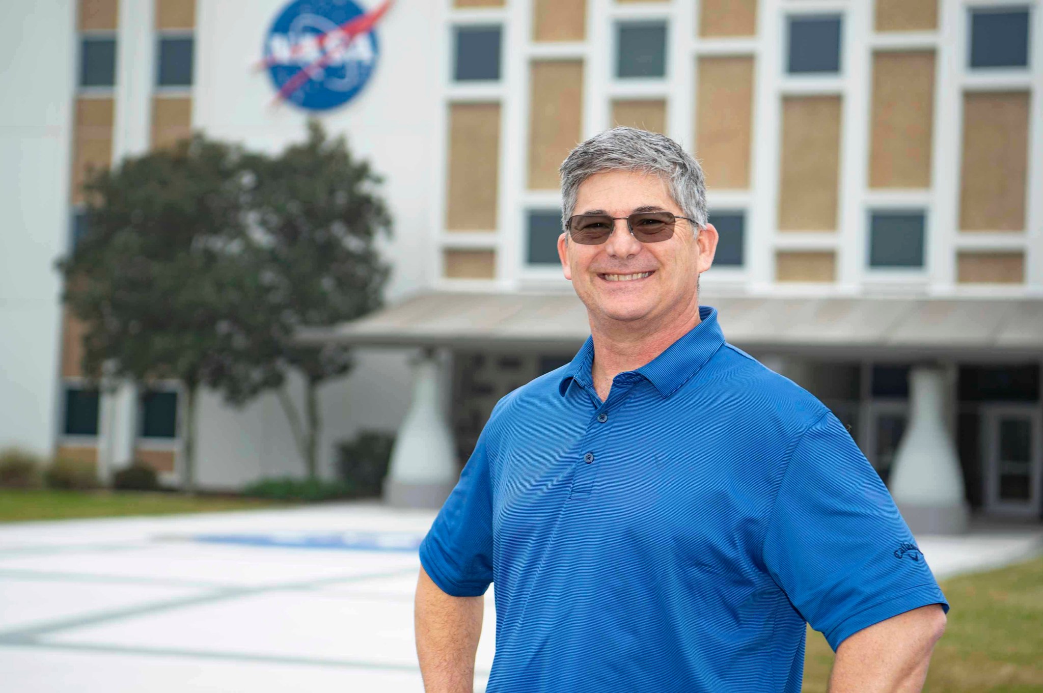 Tom Lipski stands in front of Building 1100 at Stennis Space Center