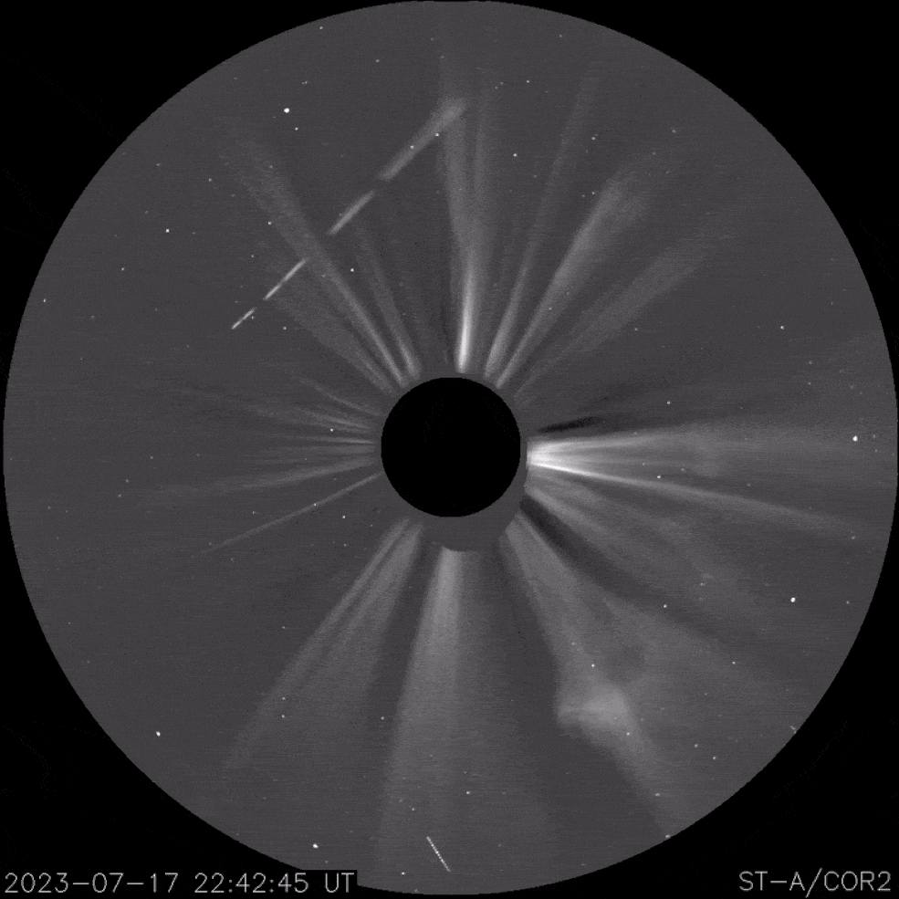 This coronagraph image shows a coronal mass ejection escaping the Sun, which is occluded behind the black circle at the center of the image.