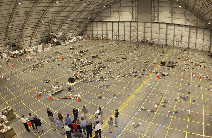 Overhead image of STS-107 debris layout in a hangar