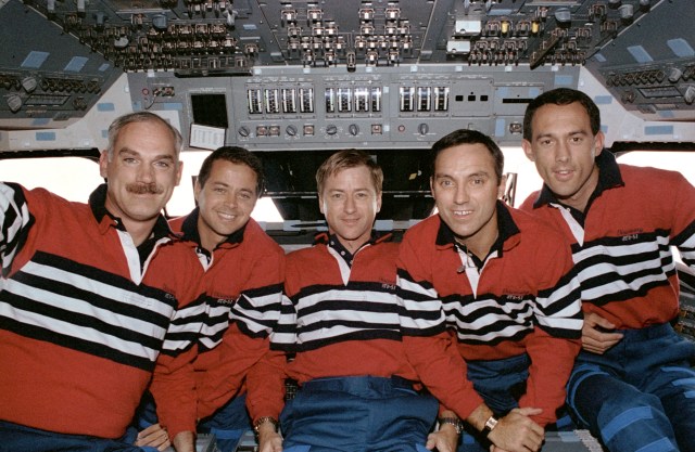 The five crew members for STS-51 pose for the traditional inflight crew portrait on Discovery's flight deck.