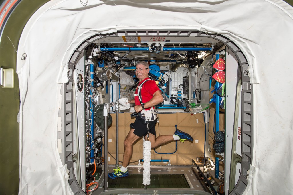 Astronaut Mark Vande Hei Expedition 53 Flight Engineer exercises on the COLBERT Combined Operational Load Bearing External Resistance Treadmill in the Tranquility module