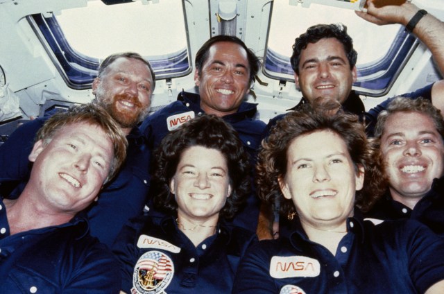 STS 41-G crew photo taken on the flight deck of the Challenger during flight
