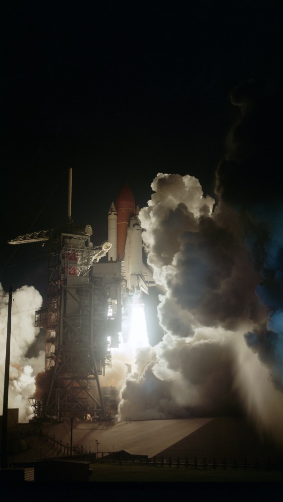 View of the early morning launch of STS 41-G Challenger