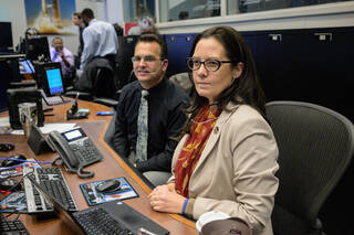 Chief Flight Director Emily Nelson in Houston's Mission Control Center observes the Orion spacecraft as it departs its distant retrograde orbit on flight day 16 of the Artemis I mission, one of the steps needed to bring the spacecraft home from the Moon. 
