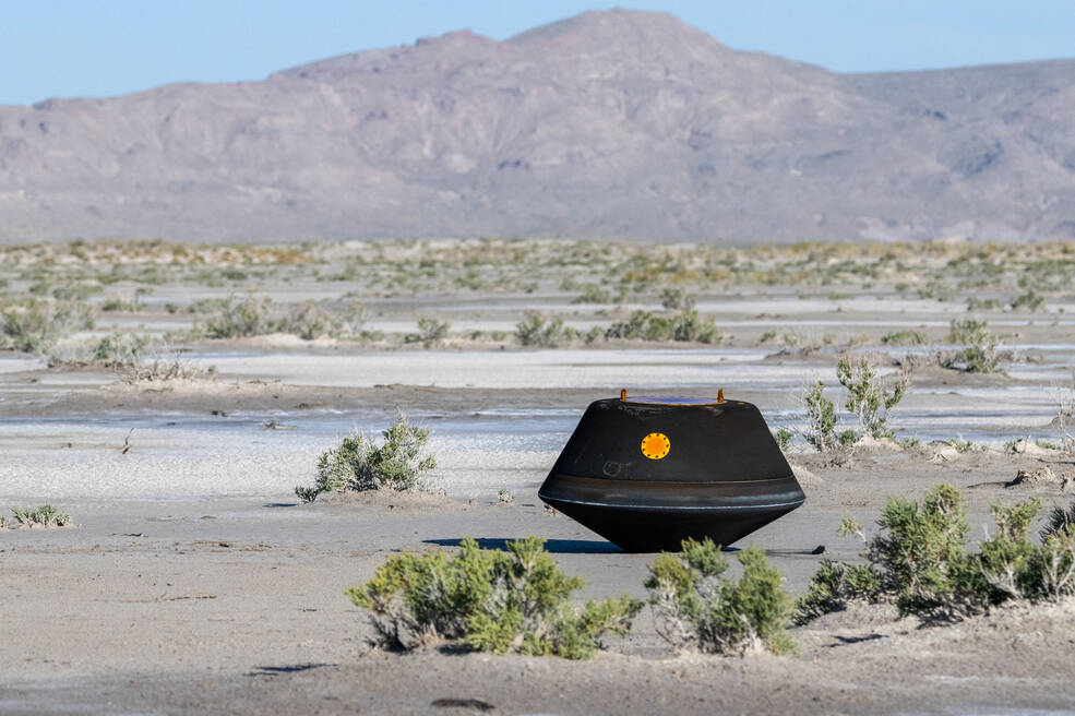The sample return capsule from NASAs OSIRIS-REx mission is seen shortly after touching down in the desert, Sunday, Sept. 24, 2023, at the Department of Defense's Utah Test and Training Range.