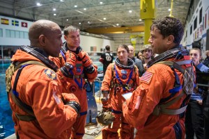 The Artemis II crew is pictured during training Jan. 23 in the Neutral Buoyancy Lab at the agency’s Johnson Space Center in Houston. As part of training for their mission around the Moon next year, the first crewed flight under NASA’s Artemis campaign, the crew practiced the recovery procedures they will use when the splash down in the Pacific Ocean.