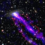 As the galaxy moves through space at 1.5 million miles per hour, it leaves not one â€” but two â€” tails behind it.