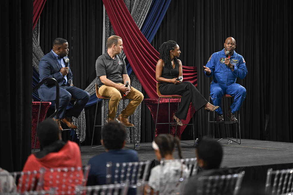 Melvin, right, speaks during a panel discussion after the screening of the documentary.