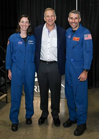 From left, NASA astronaut candidate Christina Birch, retired NASA astronaut Dr. Scott Parazynski, and NASA astronaut Delaney stand together after participating in a Safety Day panel.
