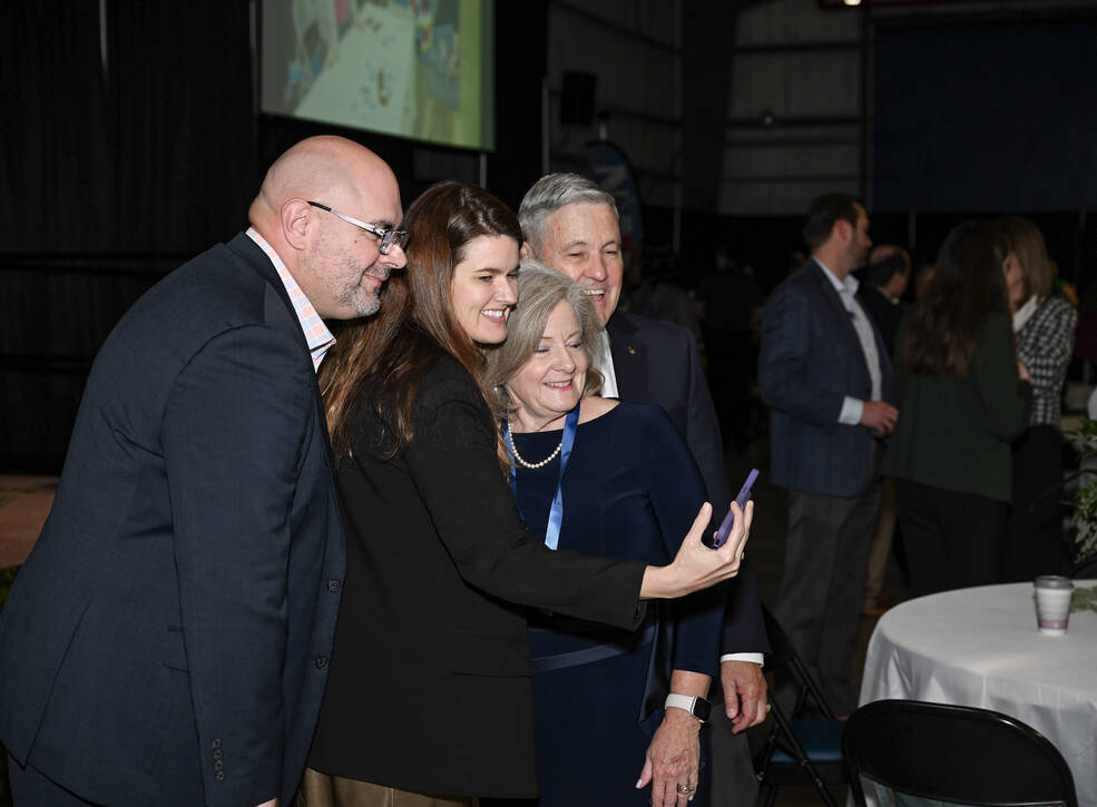 Singer, center right, poses for a selfie with her former coworkers Sept. 21 during her retirement ceremony. Joining her, from left, are Pelfrey, NASA Deputy Associate Administrator Casey Swails, and NASA Associate Administrator Bob Cabana.