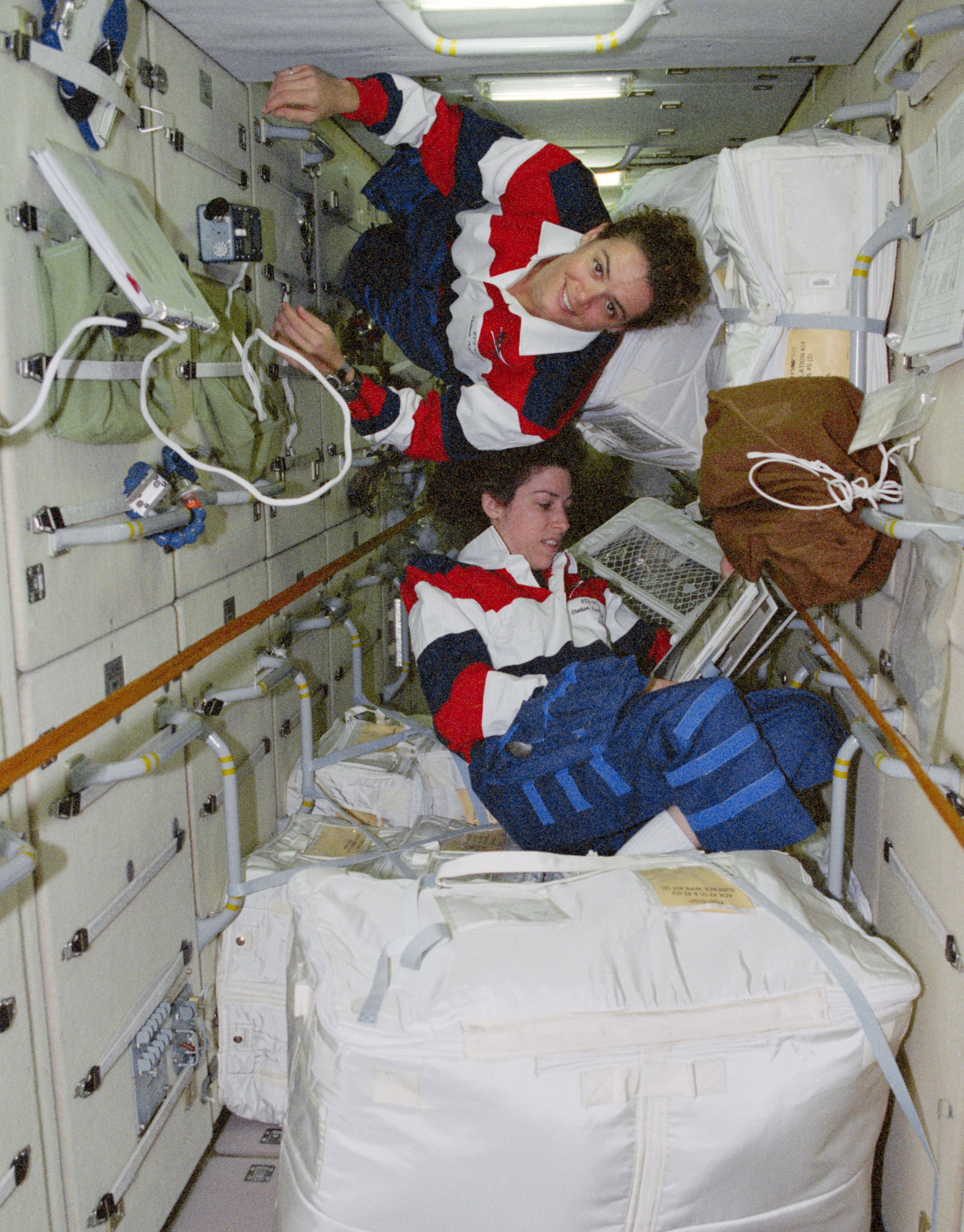 Ochoa with fellow STS-96 crewmembers Julie Payette of the Canadian Space Agency in the Zarya module.