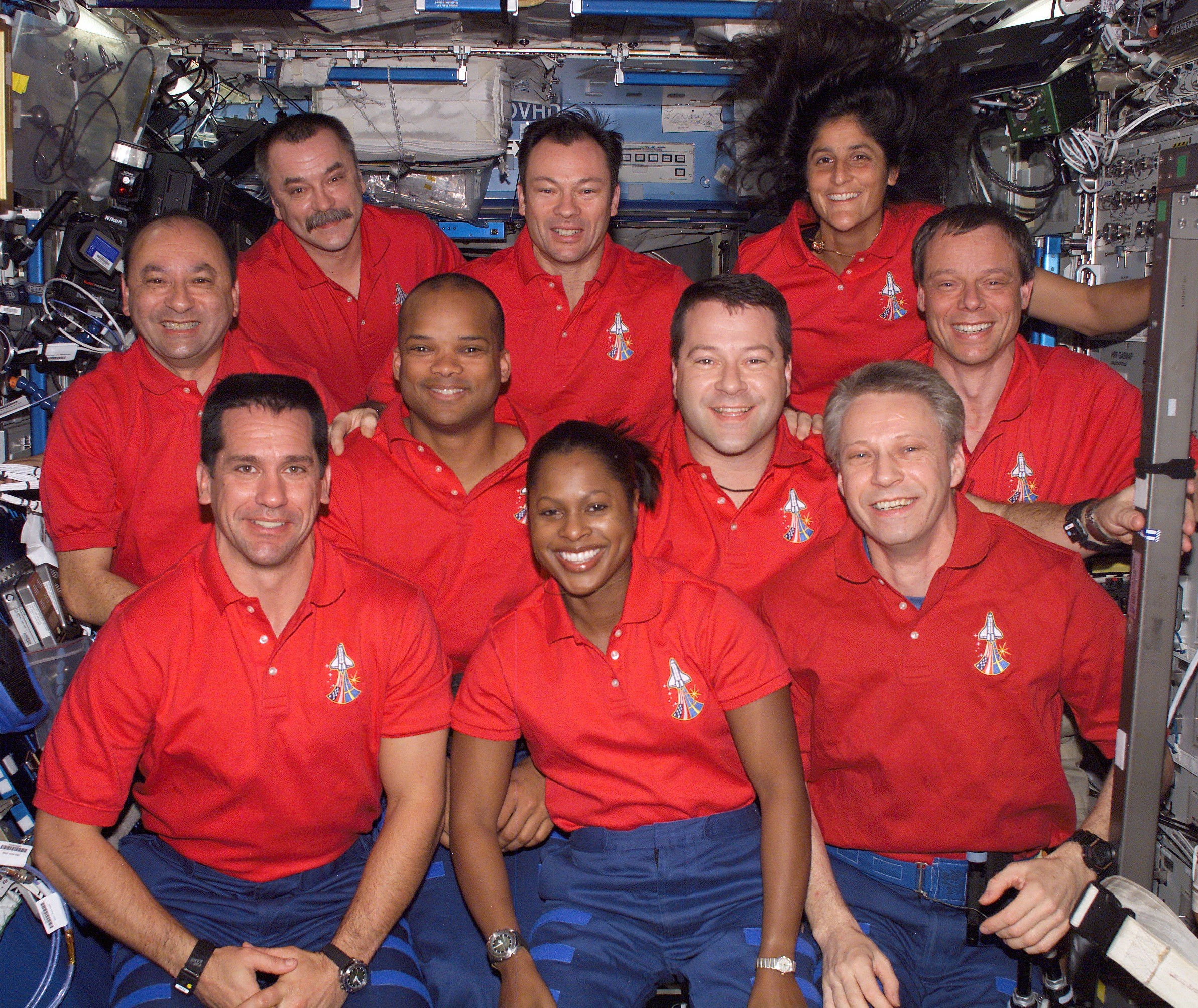 Lopez-Alegria, back row middle, with STS-116 and Expedition 14 crew members