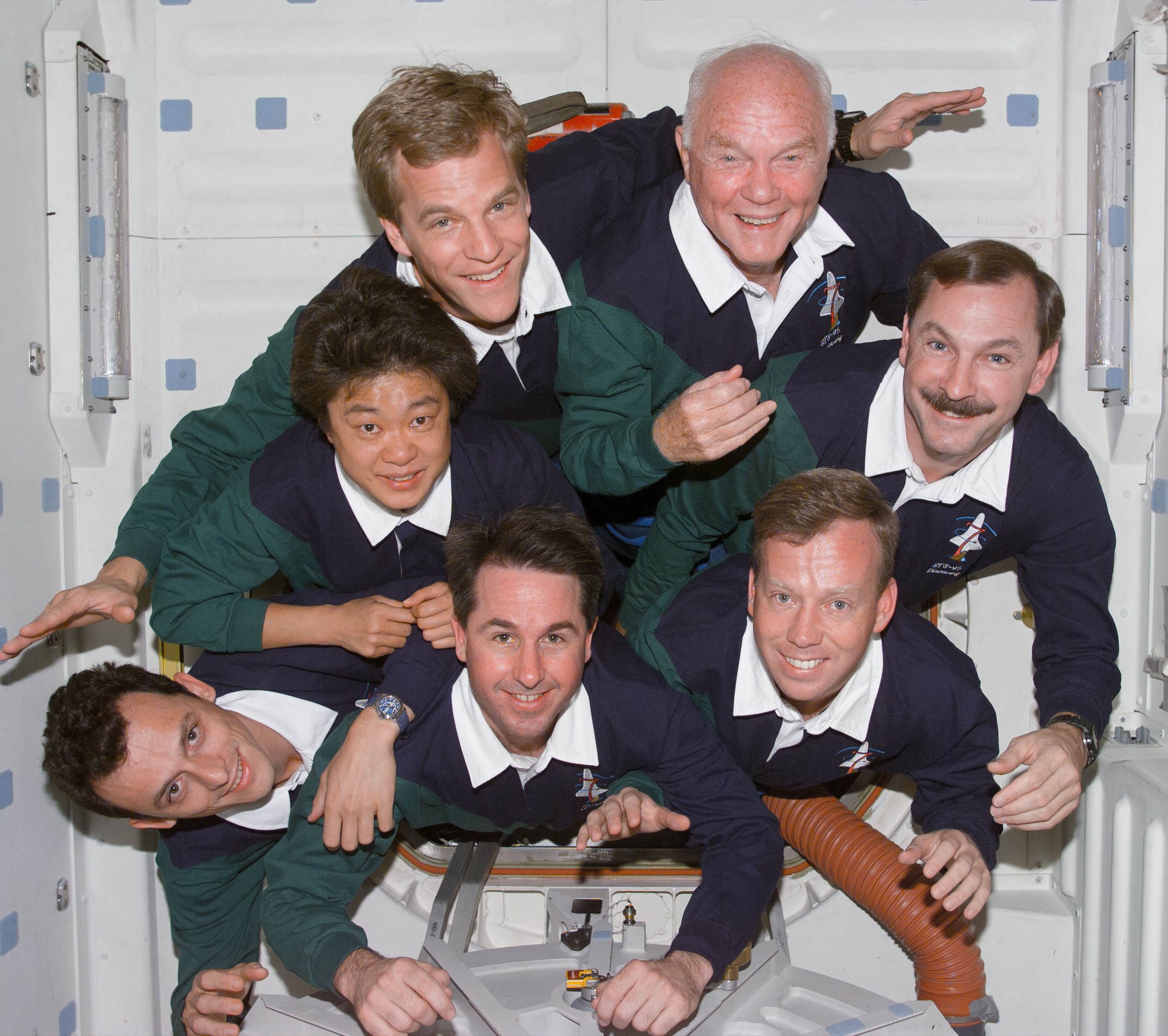 Spanish astronaut Pedro Duque, lower left, representing the European Space Agency, with his STS-95 crewmates