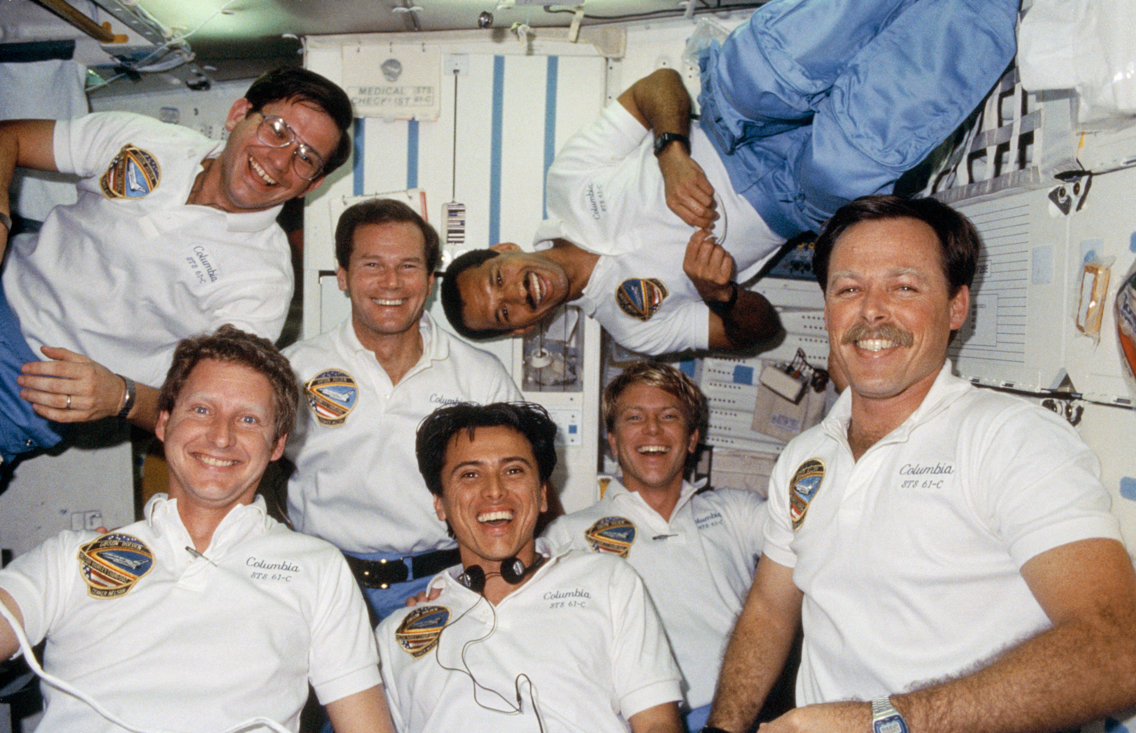 Franklin R. Chang-Díaz, center, the first Hispanic American astronaut, with his fellow STS-61C crew members