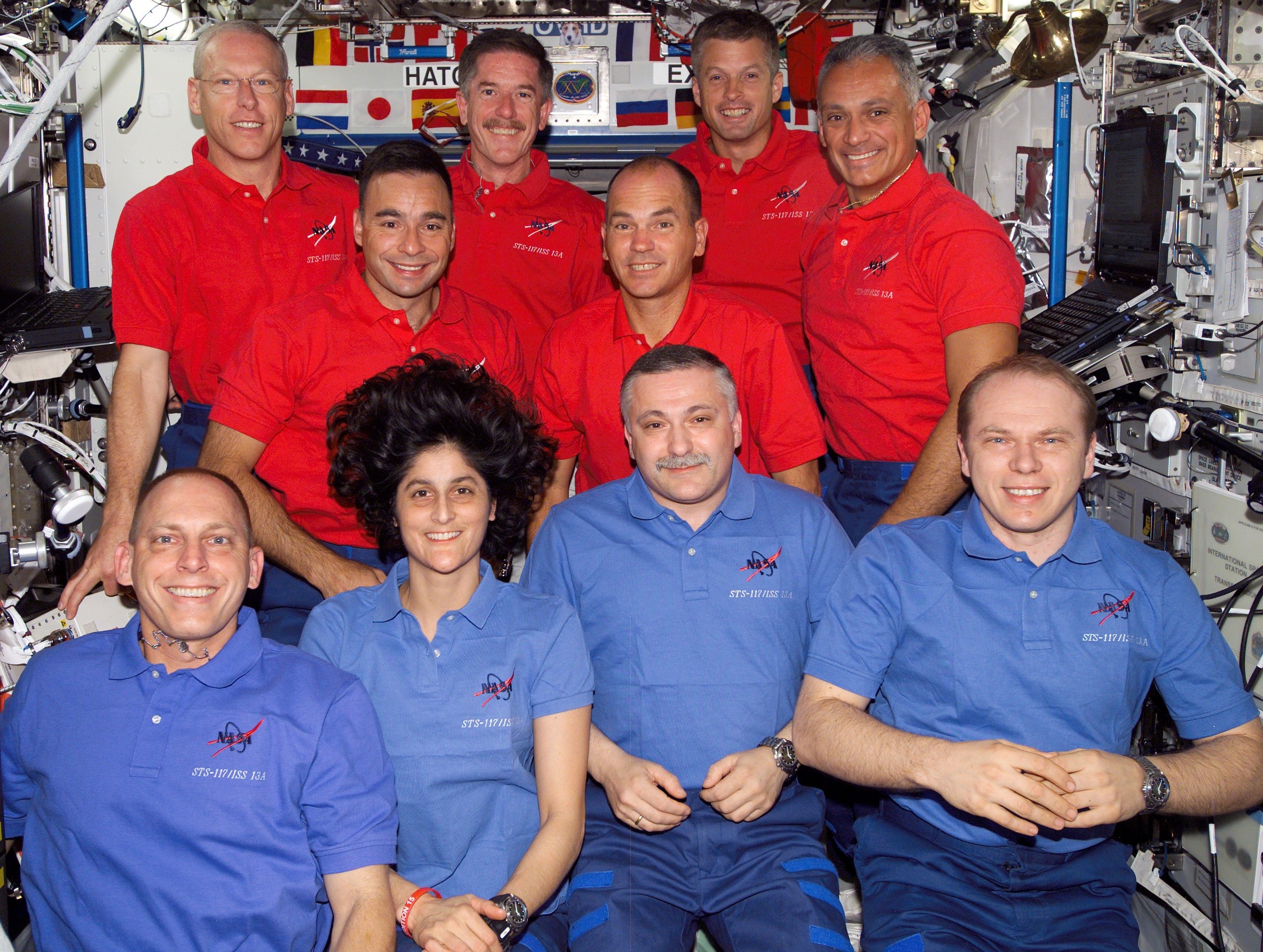 Olivas, back row at right, with the STS-117 and Expedition 15 crews