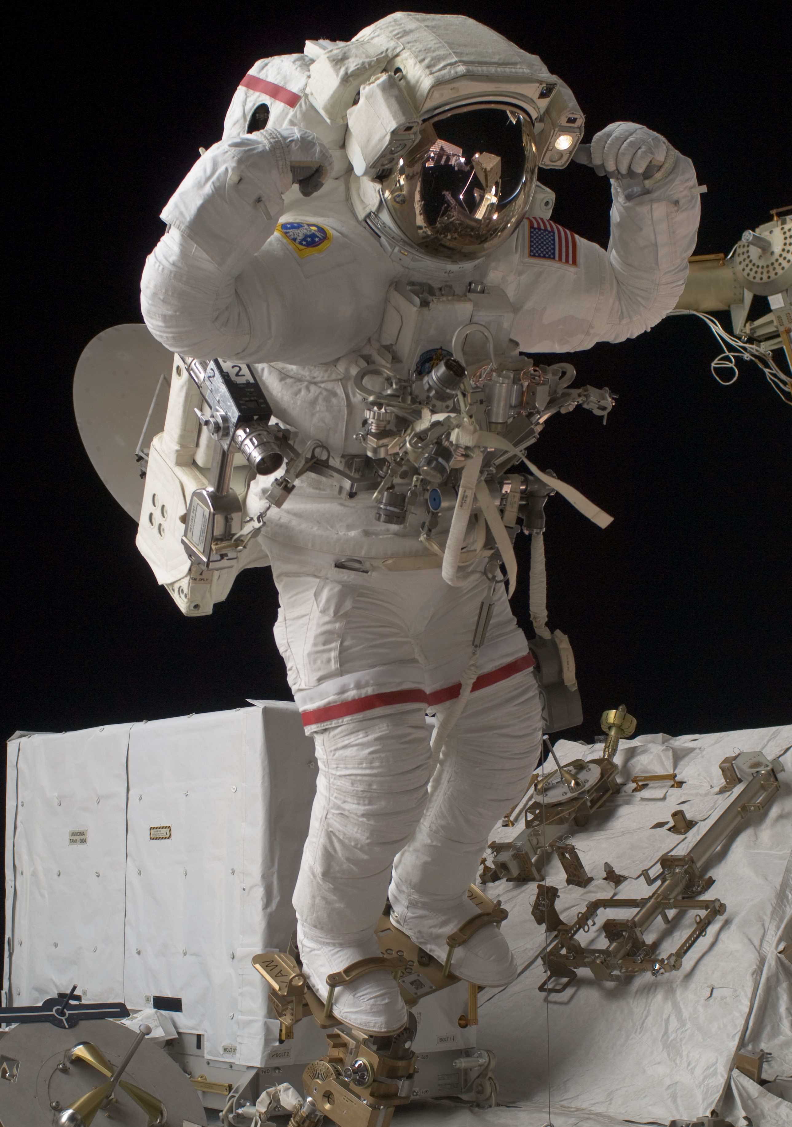NASA astronaut John D. “Danny” Olivas poses during spacewalk work on the Ammonia Tank Assembly.