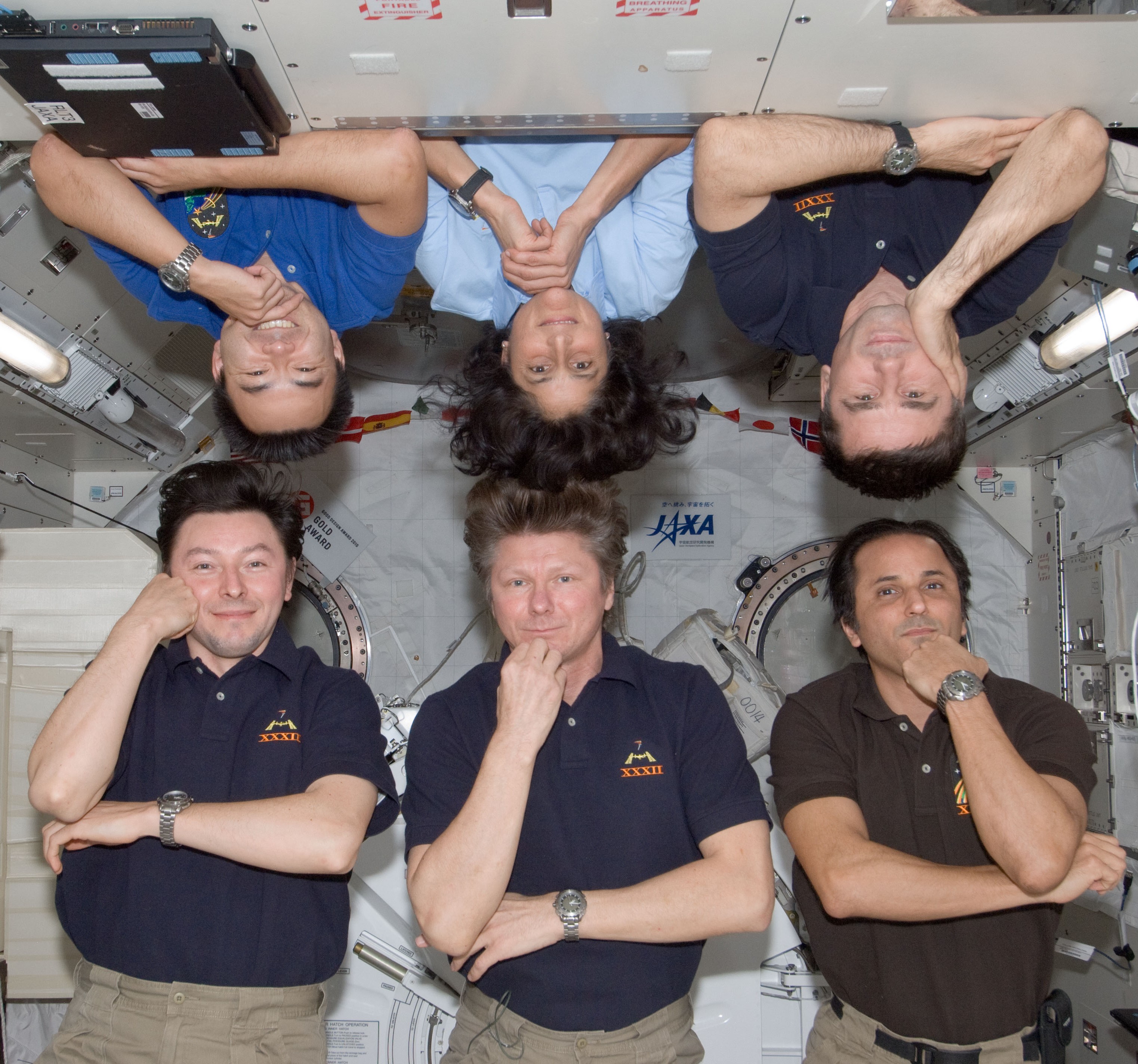 NASA astronaut Joseph M. Acaba, lower right, with this Expedition 32 crewmates.