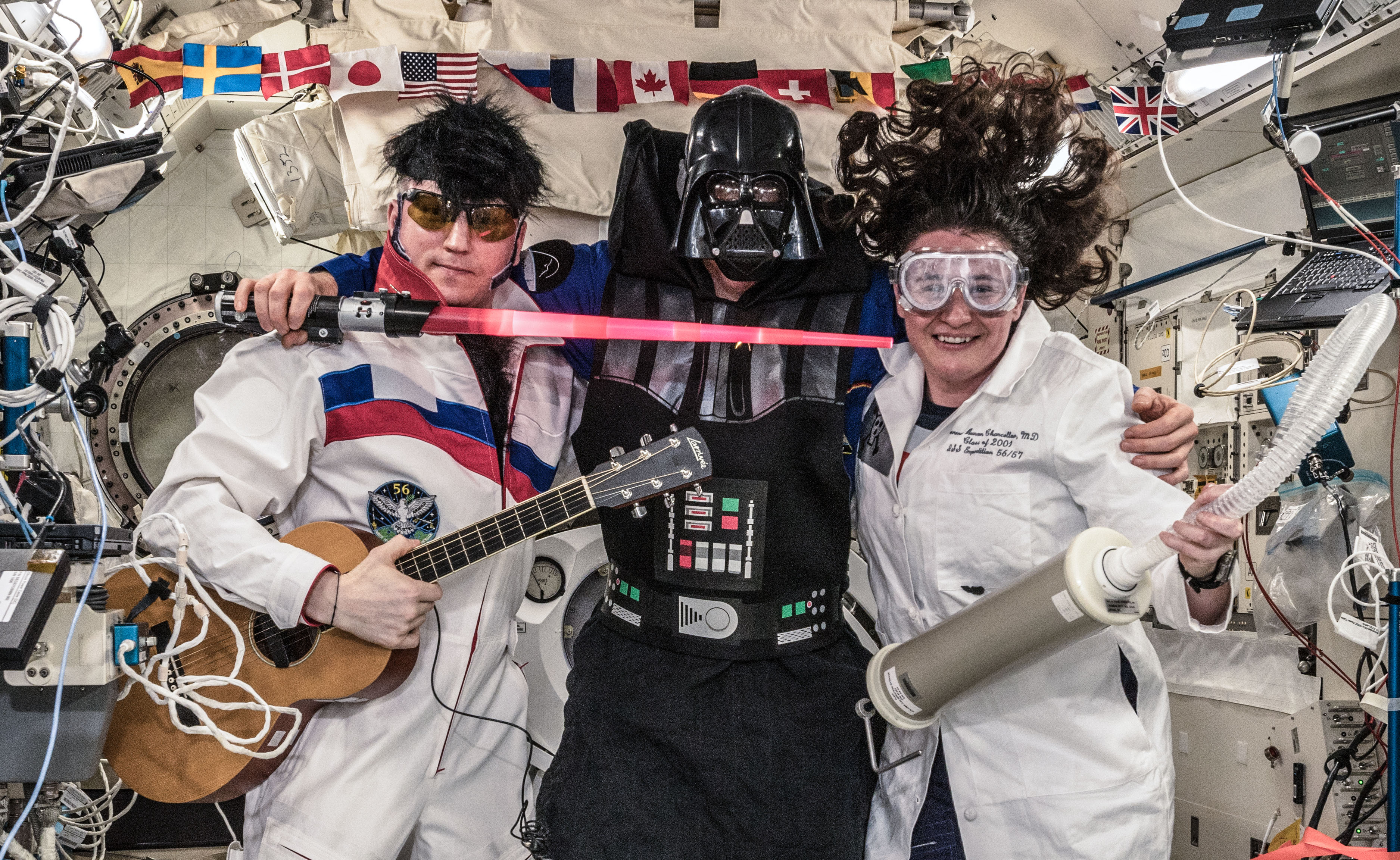 Expedition 57 crew members in their best Halloween outfits
