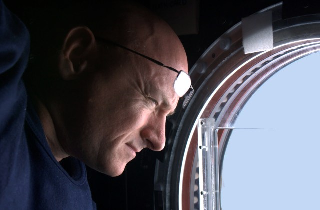 Astronaut Scott Kelly watches the Earth go by from a cupola window. Isolation and confinement is a condition of expeditions to the space station. Journaling is one way to combat some of the effects.