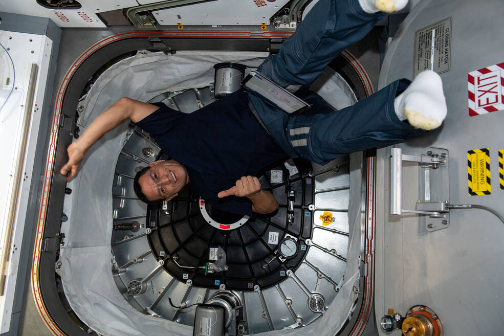 NASA astronaut Frank Rubio poses in front of BEAM, the Bigelow Expandable Activity Module.