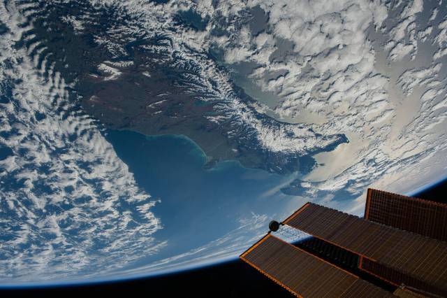 Expedition 69 Flight Engineer Jasmin Moghbeli captured this image of New Zealand, dotted by white clouds, on Sept. 12, 2023, as the International Space Station orbited 230 miles above the island nation