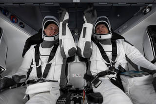 NASA astronauts (from left), Warren 